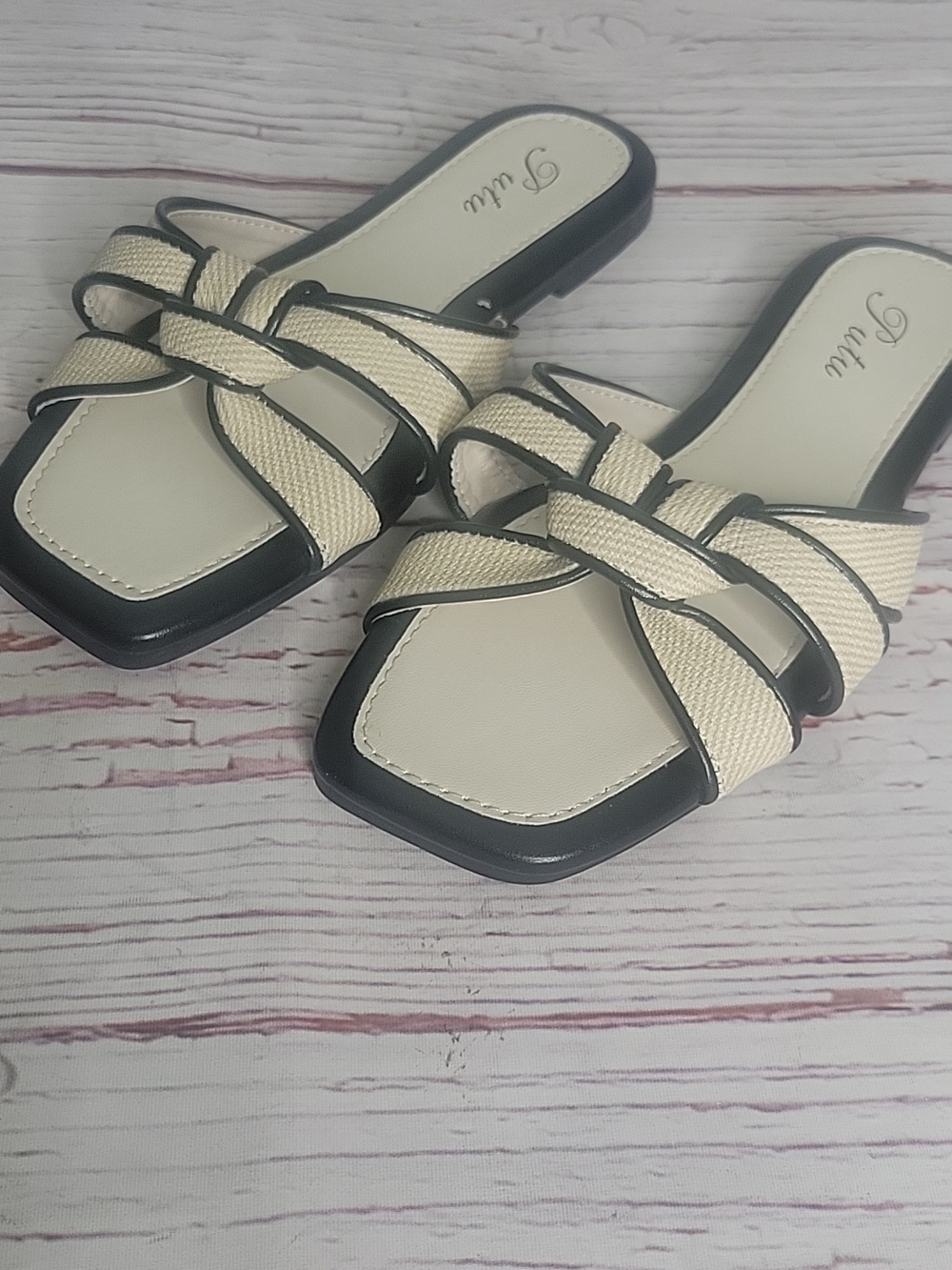 Putu Black And Cream Slide Flats with Black Trim and Knot Detail. Size 7.5